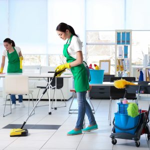 Cleaning service team working in office